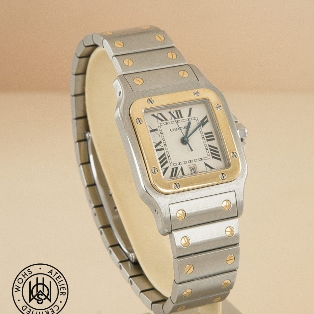 Cartier wristwatch with a two-tone steel and gold case and bracelet, Roman numeral dial and date window at 6 o'clock. DSC03077