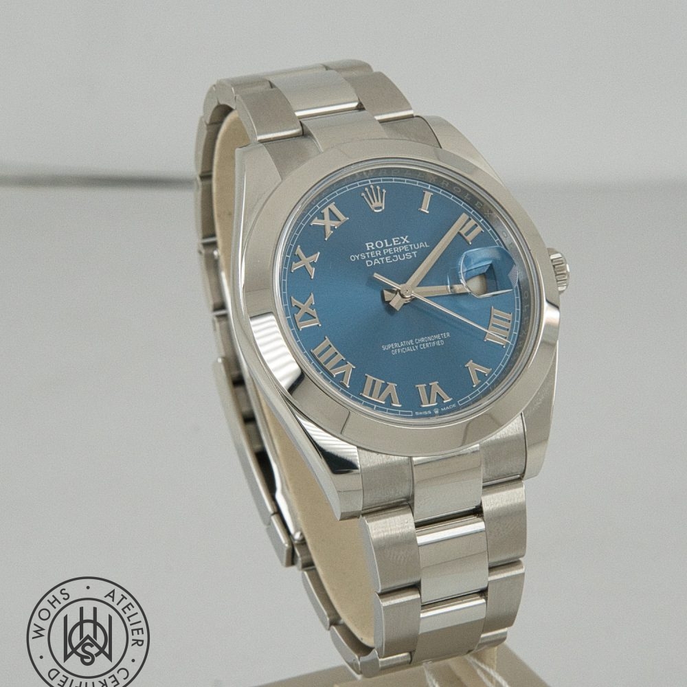 Rolex Oyster Perpetual Datejust wristwatch with a blue dial and Roman numeral markers on a stainless steel bracelet. Rolex Datejust 41 2026 reference 126300 box papers blue azzuro dial 3