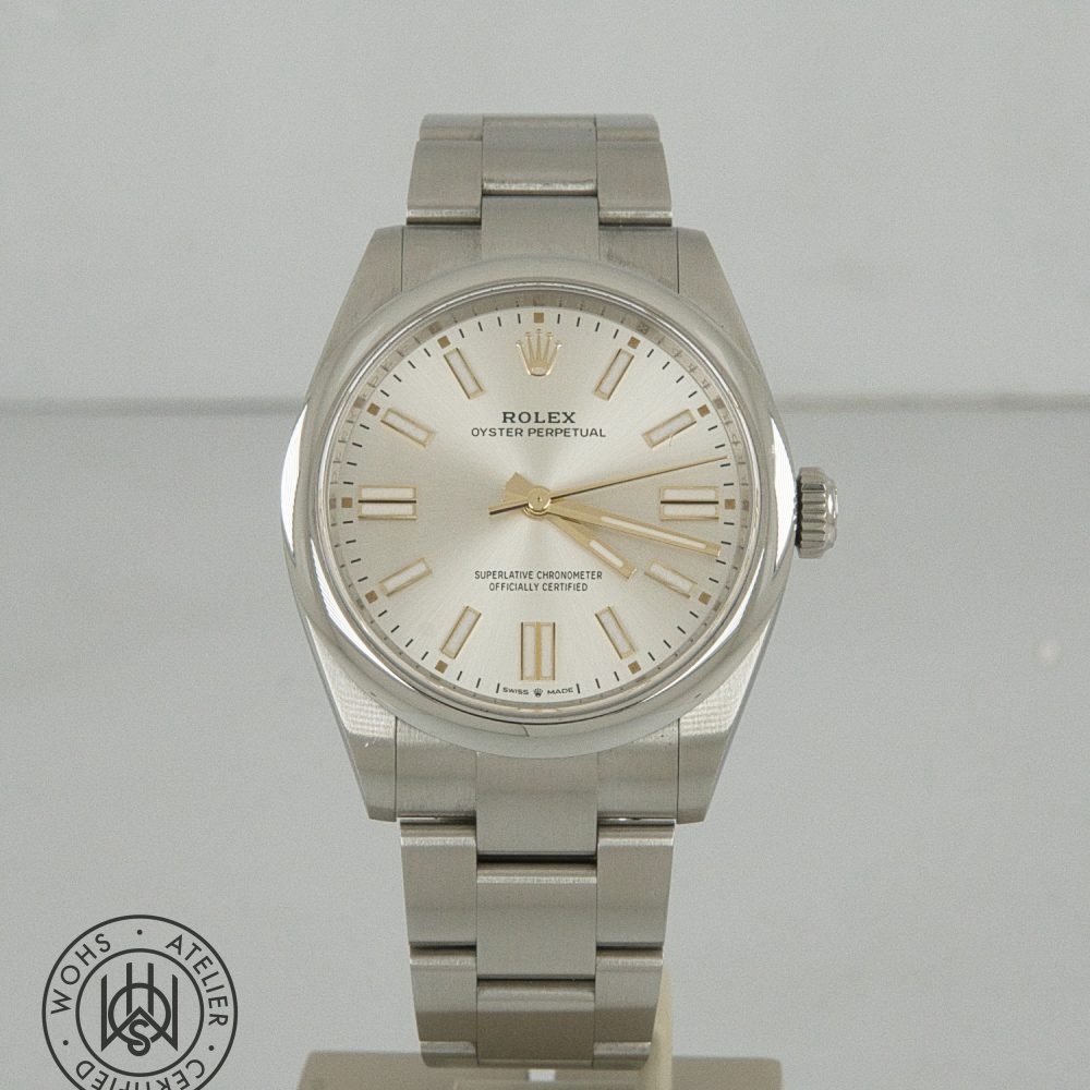 Rolex Oyster Perpetual Pre-Owned reference 134300 41mm silver dial box papers 2025 2 - Watches Of Henley St Close-up of a Rolex Oyster Perpetual stainless steel wristwatch on a display stand. Rolex Oyster Perpetual Pre-Owned reference 134300 41mm silver dial box papers 2025 2